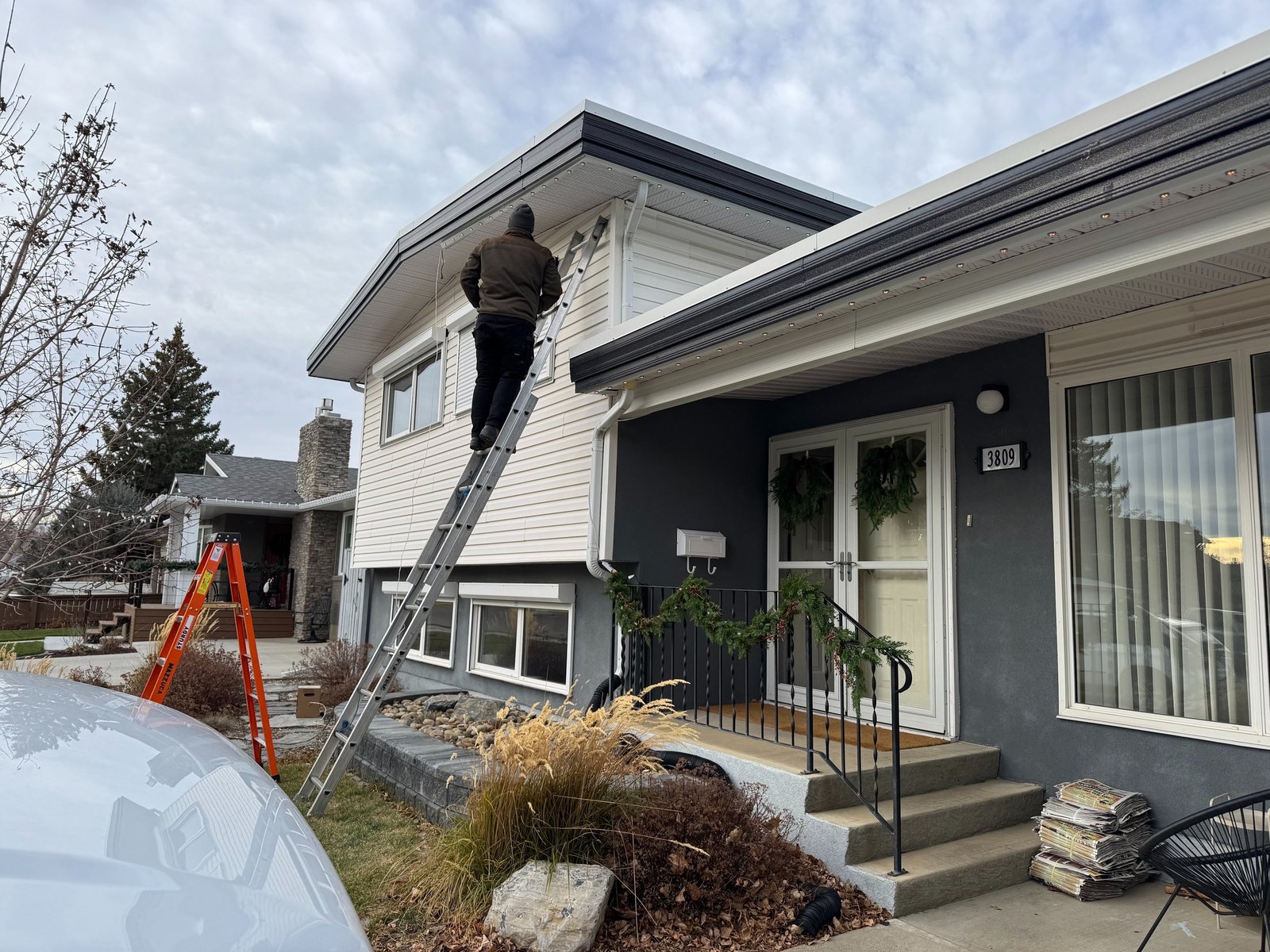 My-Lites technician installing permanent outdoor lighting